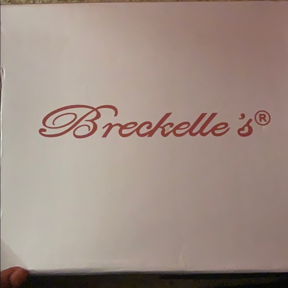 Breckelle’s Brown/Tan lace up heels